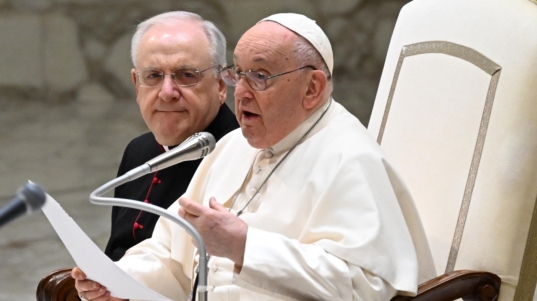 Vatican City (Vatican City State (holy See)), 10/01/2024.- Pope Francis (R), sitting next to Italian priest Monsignor Leonardo Sapienza, delivers an addres during his weekly general audience in the Paul VI Audience Hall, Vatican City, 10 January 2024. (Papa) EFE/EPA/MAURIZIO BRAMBATTI