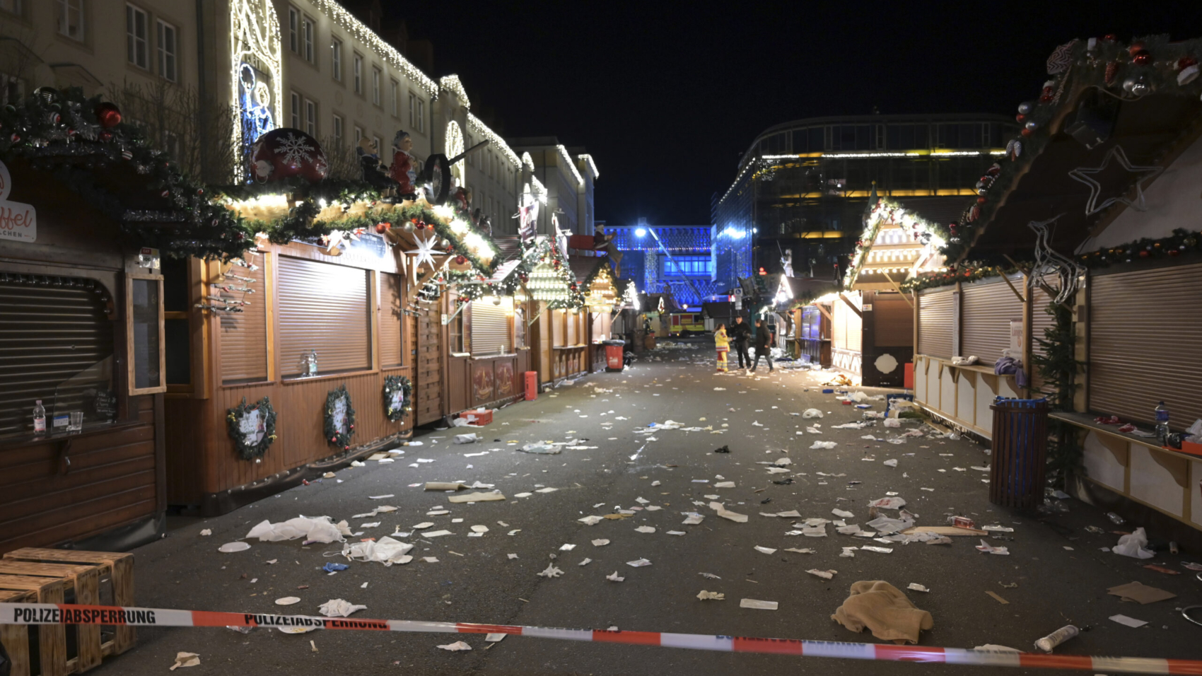 A view of the cordoned-off Christmas market after an incident in Magdeburg, Germany, Friday Dec. 20, 2024. (Heiko Rebsch/dpa via AP)