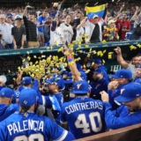 Venezuela team celebrate their victory over Japan after a World Baseball Classic quarterfinal game, Saturday, March 14, 2026, in Miami. (AP Photo/Lynne Sladky)